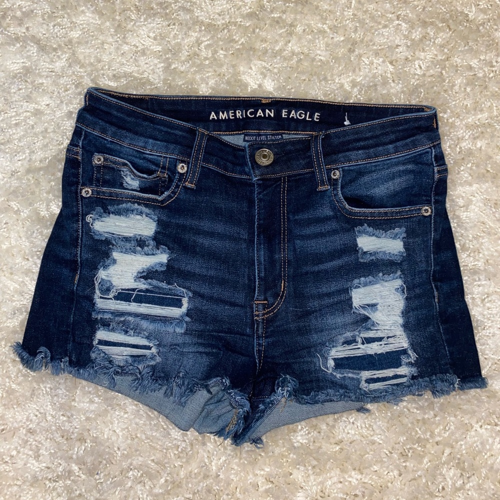 Dark wash, next level stretch mid rise shorts, size 6